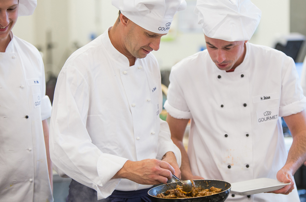 Die Entwicklungsköche beim gemeinsamen Kochen